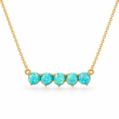Collier opale turquoise en argent plaqué or, 5 opales rondes en barre, packshot fond blanc, bijou femme Kylara