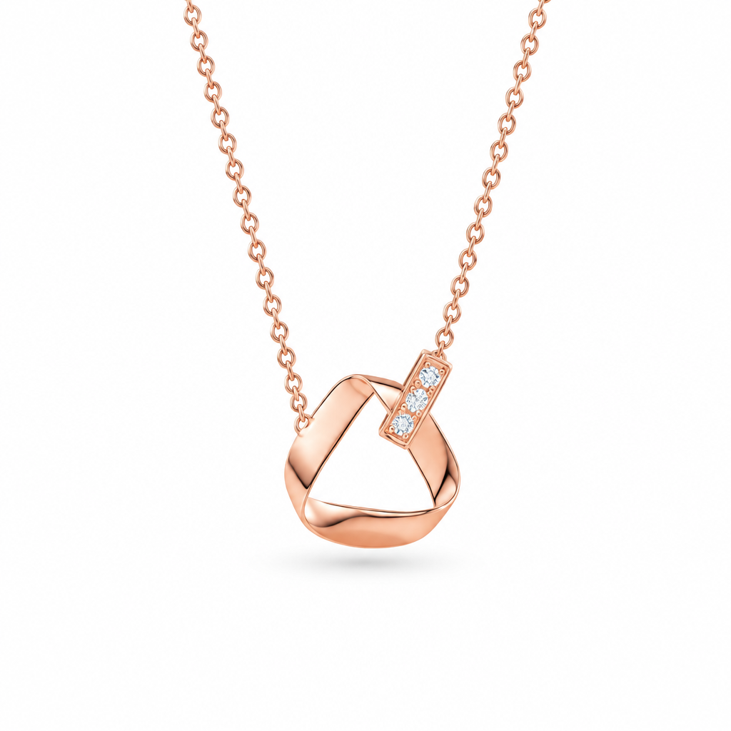 Packshot collier Möbius or rose fond blanc